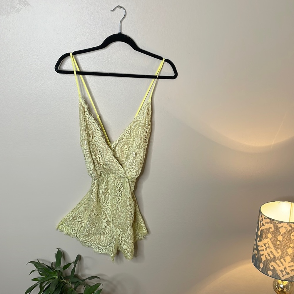 Lacey pale yellow romper